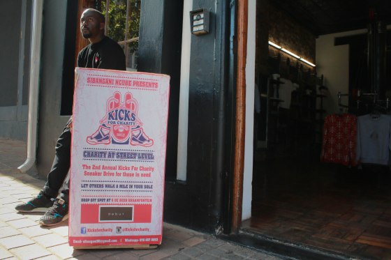 KICKS FOR A CAUSE: Sibangani Ncube the founder of Kicks for Charity, standing outside the clothing store debute in Braamfontien on Wednesday, where people can donate their old sneakers for kids that can't afford them. Photo by: Raquel De Canha